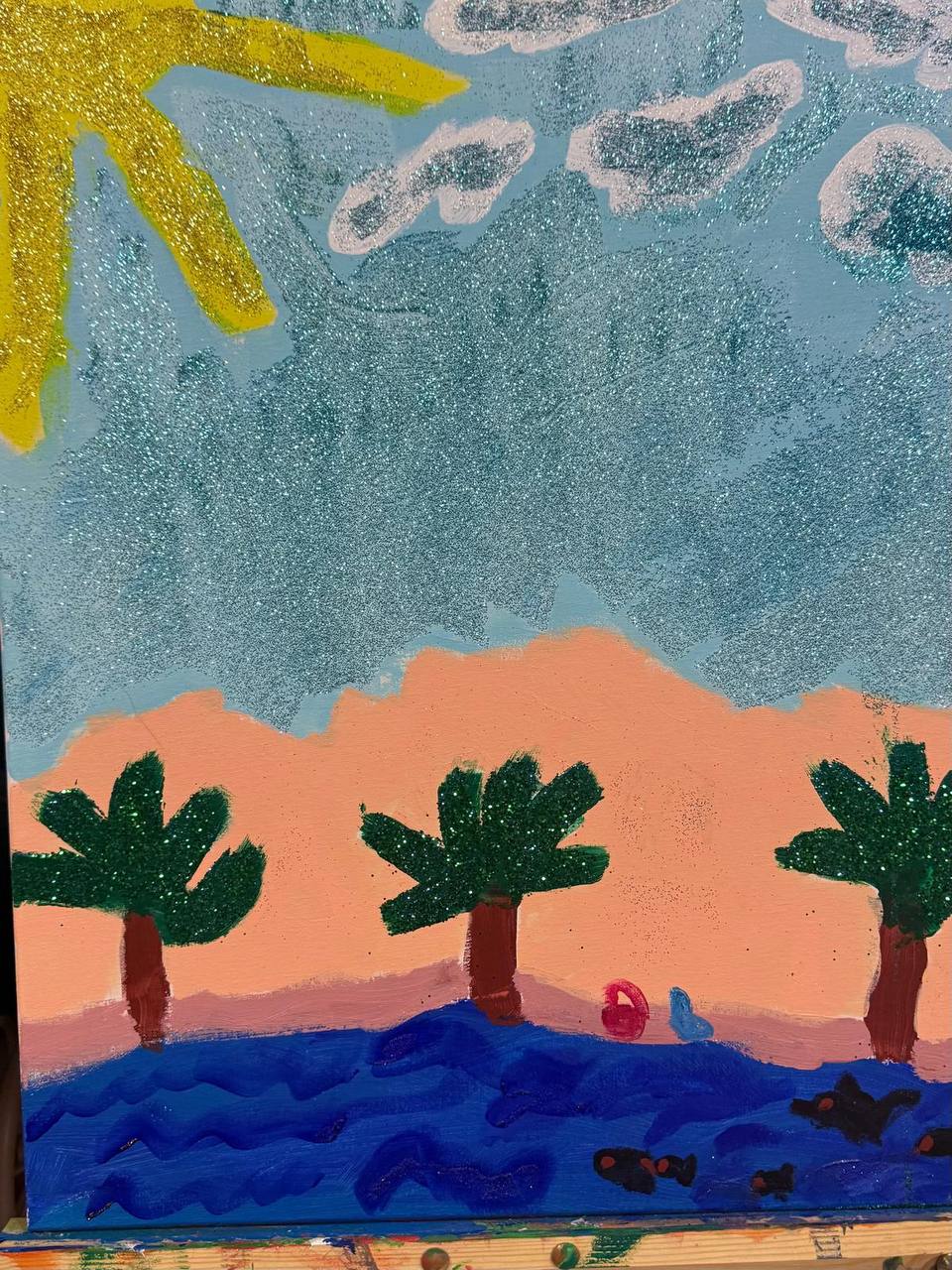 Beach sunset with palm trees, clouds, blue water, and a glittery sky — a tempera painting by Dayana Superstar